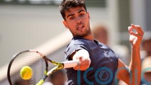 Carlos Alcaraz banishes injury fears with dominant opening win at Roland Garros