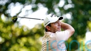 Francesco Molinari makes halfway cut with last-gasp hole-in-one