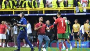 Portugal boss Roberto Martinez voices worry over pitch invaders seeking selfies