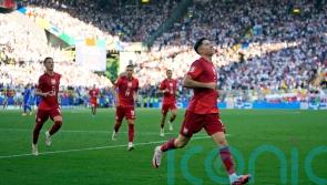 Robert Lewandowski penalty earns Poland a point as France miss out on top spot