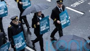 Aer Lingus pilots march around Dublin Airport during eight-hour strike