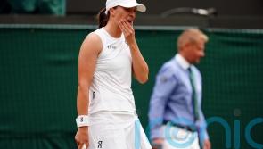 World number one Iga Swiatek out of Wimbledon as 21-match winning streak ends