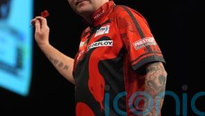James Wade brings early end to Nathan Aspinall&rsquo;s title defence