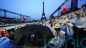 Rain puts a dampener on the Paris Olympics opening ceremony down the River Seine