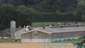 Fatalities feared after helicopter crashes into farm building