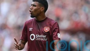 Dundee coast to victory over Hearts to go top of fledgling table