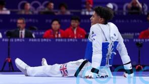 Caden Cunningham wins silver in taekwondo final