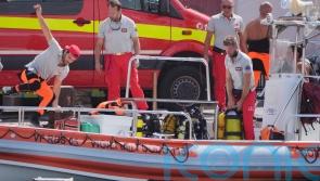 Search for six people missing in sunken superyacht enters third day