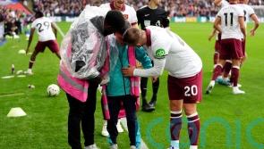 West Ham duo free ball boy from under collapsed hoarding amid fan celebrations