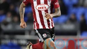 Josh Magennis scores hat-trick as Exeter edge past Barnet in FA Cup thriller