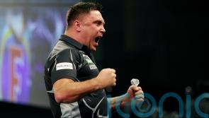 Gerwyn Price eases past Keane Barry to reach third round at Alexandra Palace