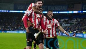 Kieffer Moore&rsquo;s double at Cardiff maintains Sheffield United&rsquo;s three-point lead