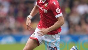 Wrexham win at Northampton to maintain promotion hopes