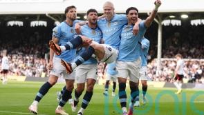 Manchester City clinch Champions League spot with victory at Fulham