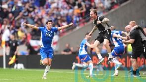 Oldham battle from behind twice to earn promotion to Football League