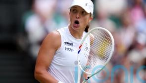 Iga Swiatek fights back to reach Wimbledon third round