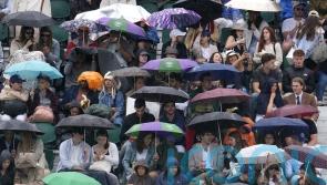 Spectators queue in ponchos as rain threatens to dampen sixth day of Wimbledon