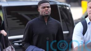 Former Arsenal midfielder Thomas Partey arrives at court to face rape charges