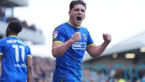 AFC Wimbledon off the mark with win over 10-man Lincoln