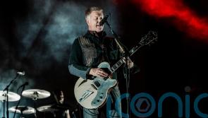 Queens Of The Stone Age headline festival rocked by controversy