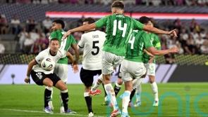 Northern Ireland beaten by quick-fire double in Germany