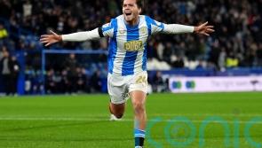 Lincoln fight back to claim draw against Huddersfield