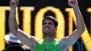 Carlos Alcaraz eases into quarter-finals with straight sets win over Tommy Paul