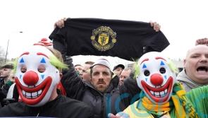 Man Utd supporters wear clown masks in protest ahead of Fulham match