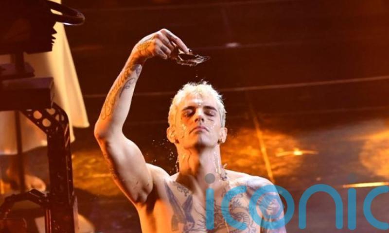 Fake baptism on stage at music festival condemned by Vatican as 'profane'