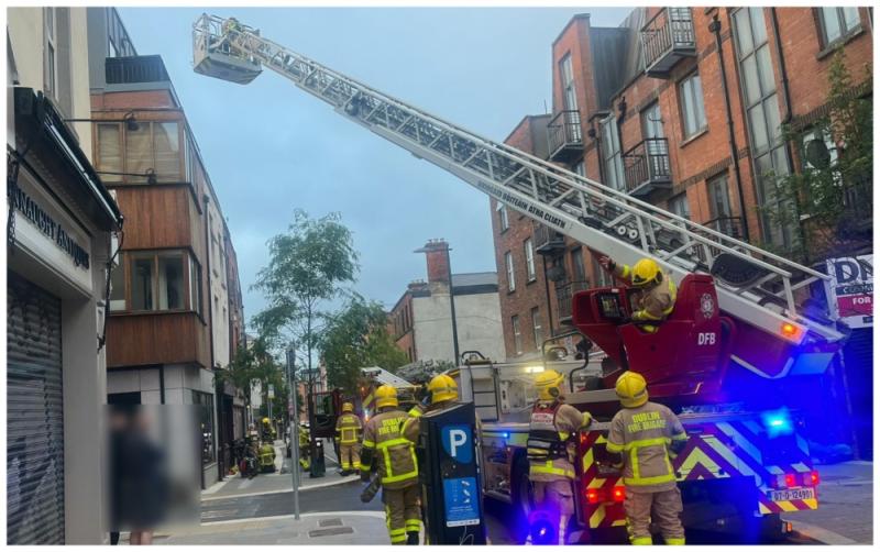 Nine people rescued from apartment building after e-bike goes on fire 