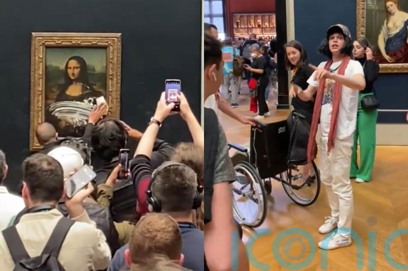 WATCH: Man disguised as woman in wheelchair hurls cake at Mona Lisa