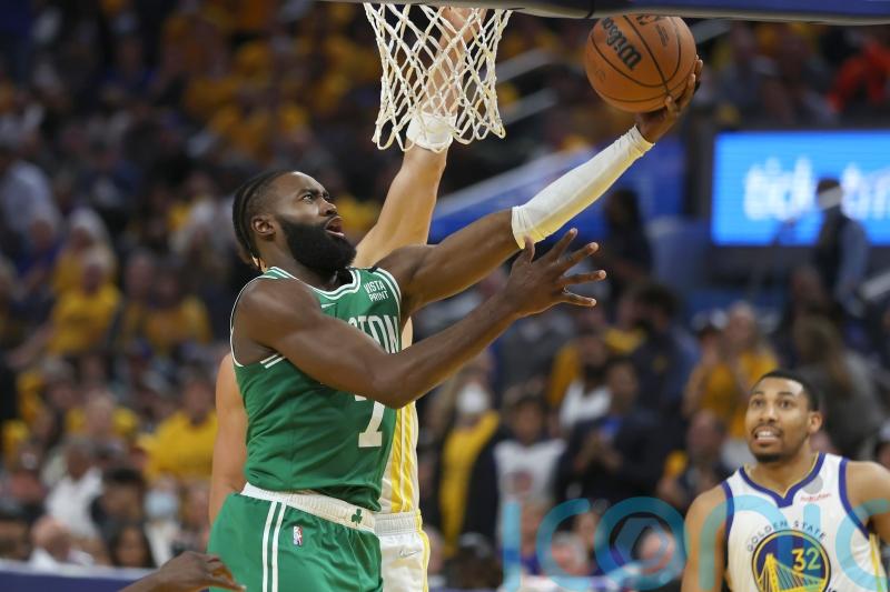 Boston Celtics ride late surge to 120-108 victory over the Golden State Warriors