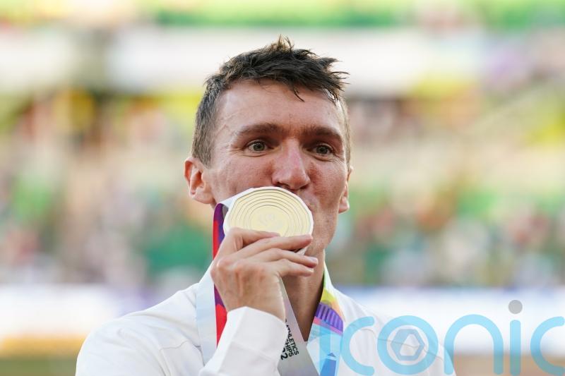 Jake Wightman owed a Mars bar by athletics club coach after &lsquo;amazing&rsquo; gold medal