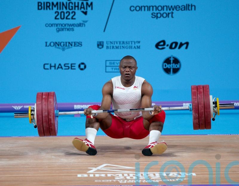 Weightlifter Cyrille Tchatchet&rsquo;s medal hopes ended by body cramps