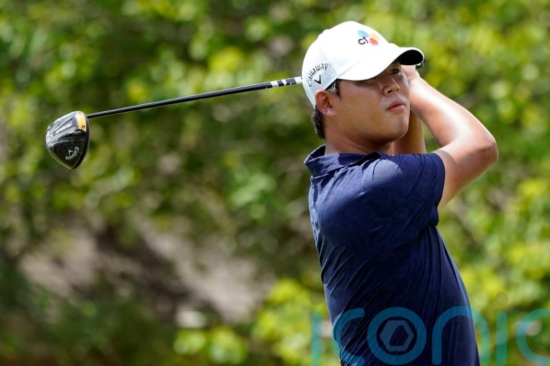 Si Woo Kim flies high with 18th-hole eagle to share FedEx lead with JJ Spaun