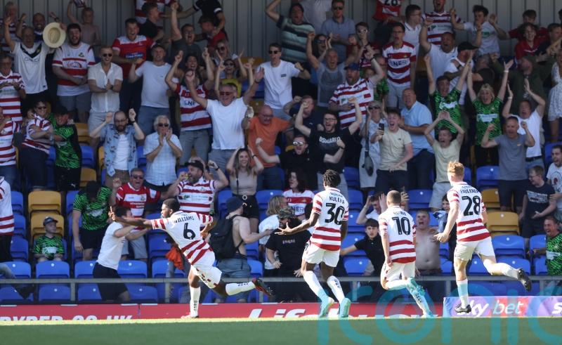 Doncaster score twice late on to claim dramatic draw at AFC Wimbledon