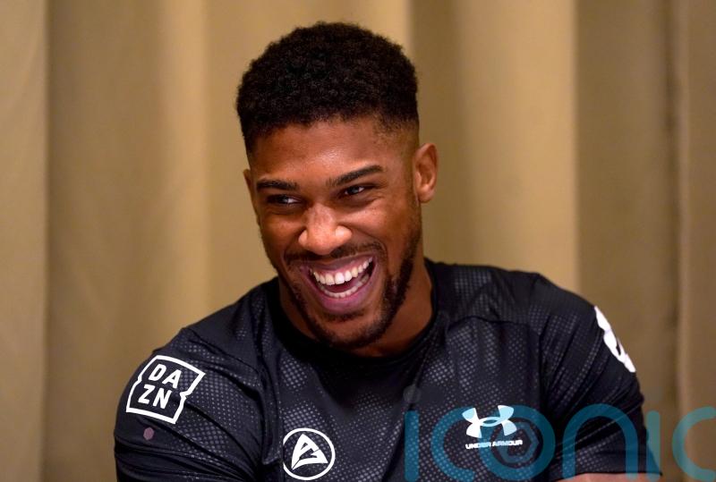 Relaxed Anthony Joshua eyes early stoppage in bid to reclaim world titles