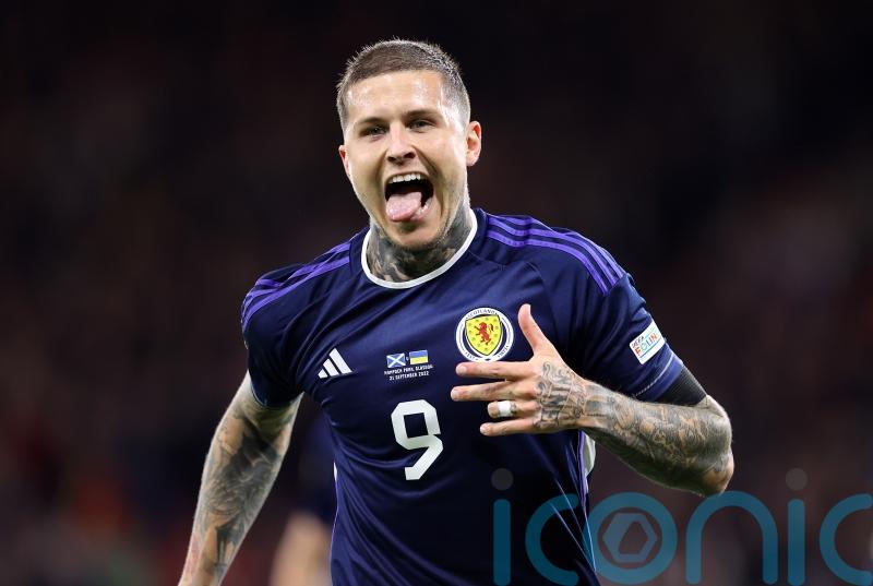 Substitute Lyndon Dykes heads in late double as Scotland beat Ukraine