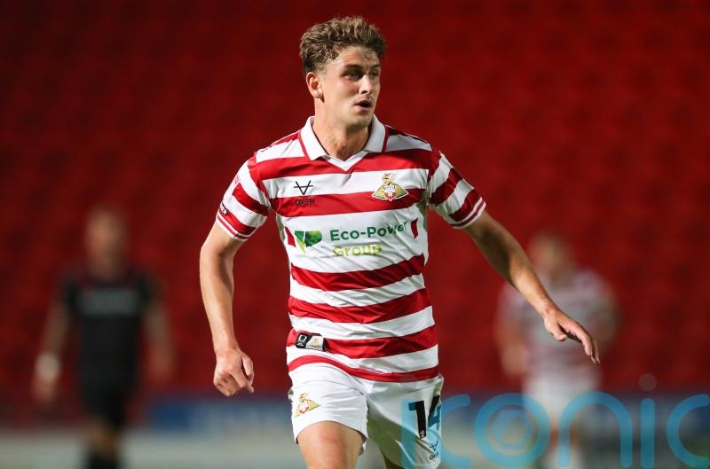 Doncaster see off Gillingham to give Danny Schofield first win