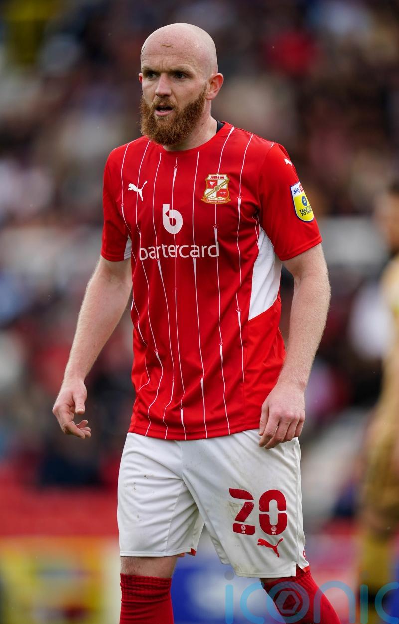 Jonny Williams double helps Swindon battle back to defeat 10-man Mansfield