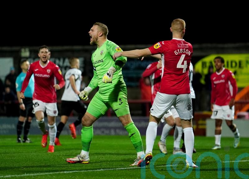 Connor Ripley saves two penalties as struggling Morecambe hold Derby