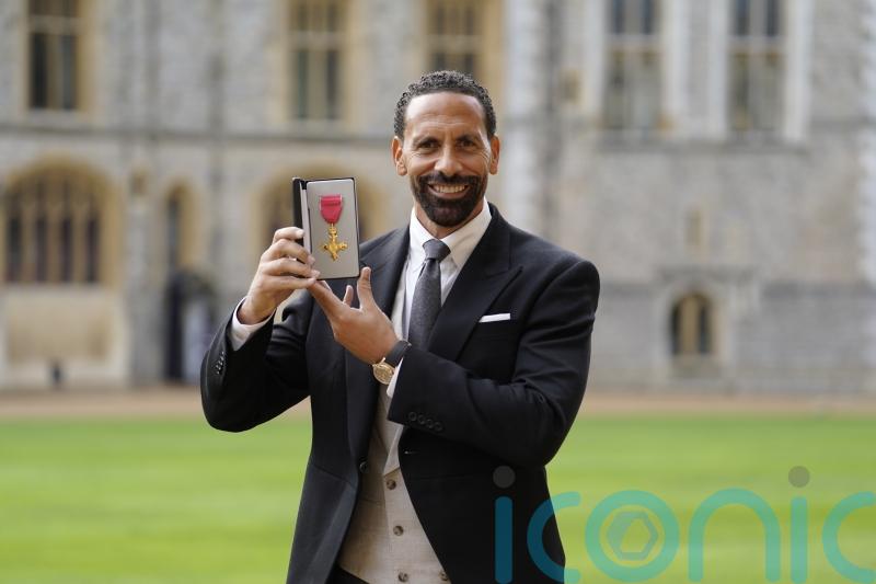Rio Ferdinand reflects on work to create &lsquo;positive change&rsquo; as he collects OBE