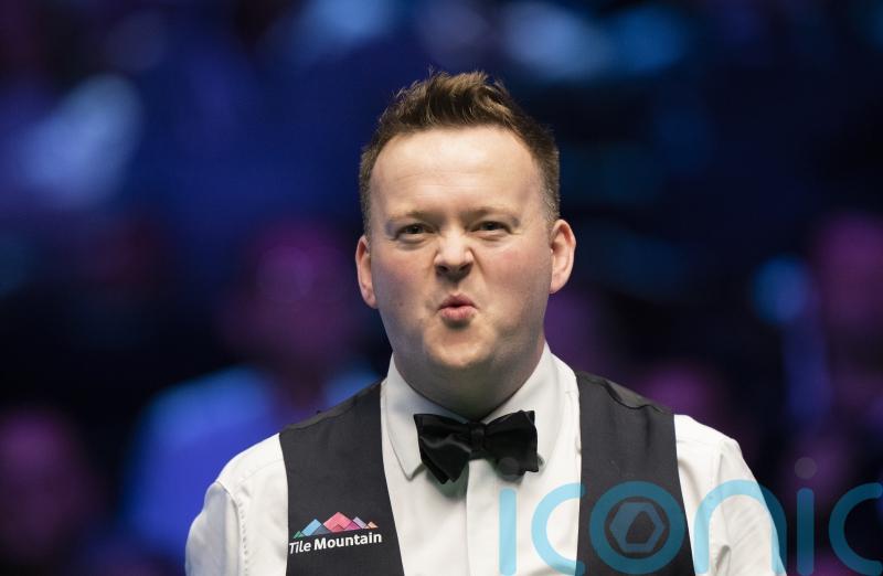 Shaun Murphy defies injury to knock Judd Trump out of UK Snooker Championship