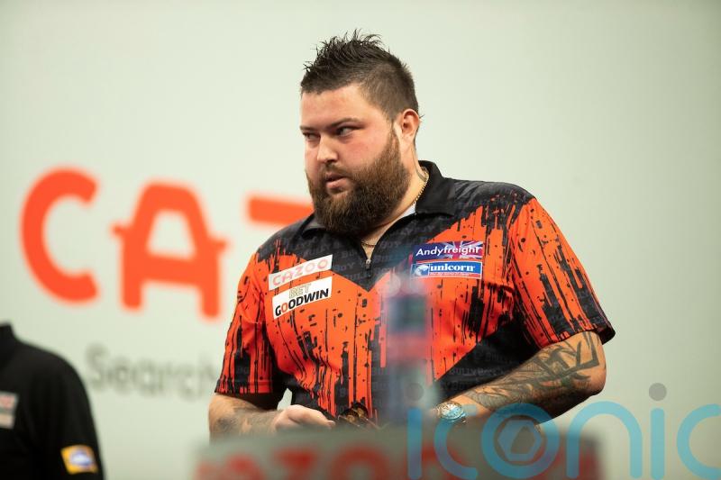 Michael Smith gets another shot at glory after toppling Raymond van Barneveld