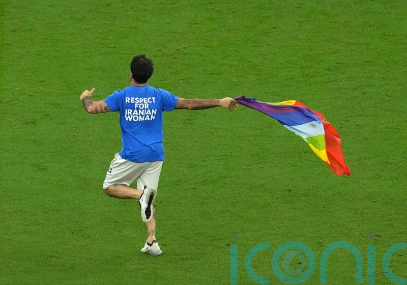 Qatar pitch invader who carried rainbow flag says he will not face legal action