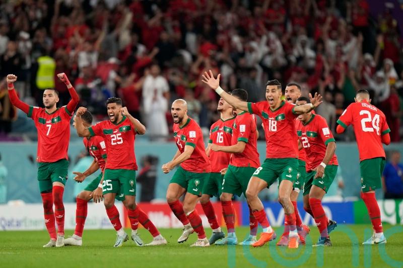 Spain crash out of World Cup after Morocco hold their nerve in penalty shootout