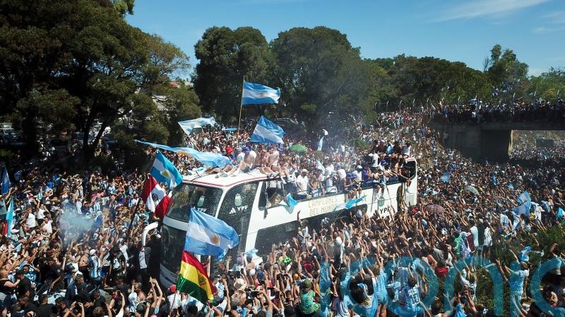 Argentina forced to swap bus for helicopters as fans swarm streets during parade