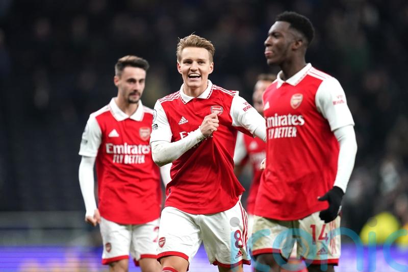 Arsenal extend Premier League lead to eight points with win at Tottenham