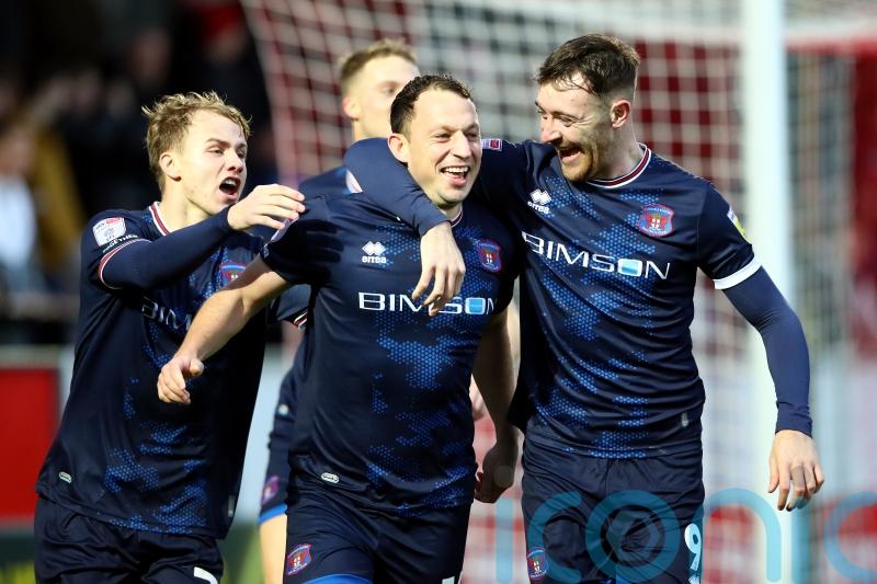 Kristian Dennis bags a brace as Carlisle close in on top three