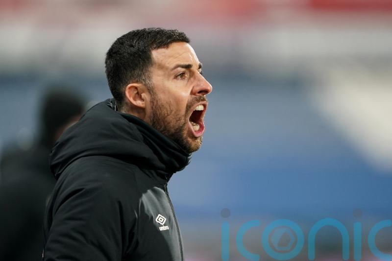 Interim boss Narcis Pelach: Neil Warnock appointment has lifted Huddersfield